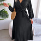 Aventura – Elegantes Plissee-Wickelkleid