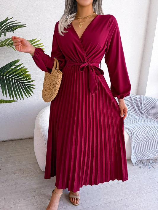 Aventura – Elegantes Plissee-Wickelkleid