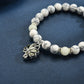 Lotus Dunkeln leuchtet Charme-Armband