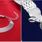 Silber geflochtenes Glücksbringer-Armband