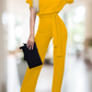 Faye - Eleganter Jumpsuit mit Ärmeln