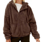 Damen Flauschige Kapuzenjacke mit praktischen Taschen und Reisverschluss WW