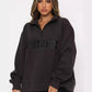Damen gemütlicher Oversized-Pullover mit durchgehendem Reißverschluss und modernem Logo-Print WW
