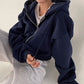 Damen Kapuzenpullover mit oversized Schnitt und praktischen Taschen WW