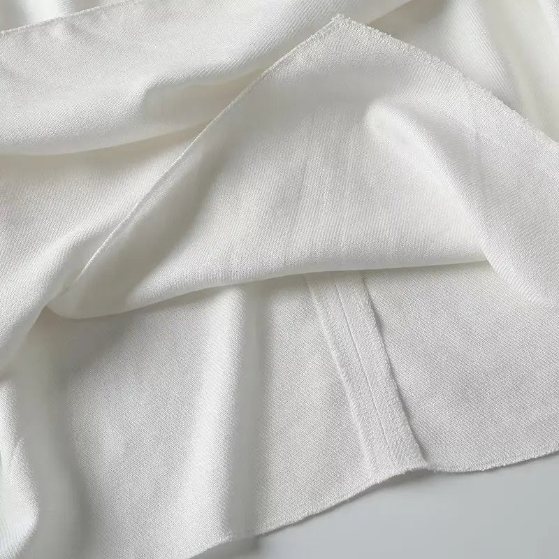 Weiße luftige & stylische ärmellose Leinenbluse für Damen – Amira