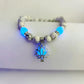 Lotus Dunkeln leuchtet Charme-Armband