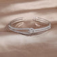 Goldknoten Kristallarmreifen