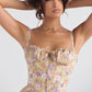 Zipporas - Tailliertes Bustier-Kleid mit modernem Frühlingsblumen-Print für 2025