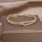 Goldknoten Kristallarmreifen